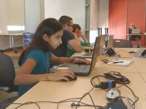 Cesar working with students